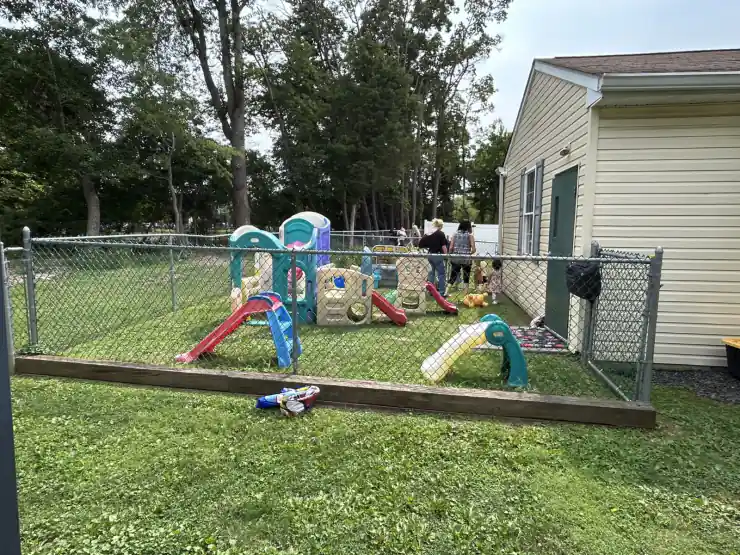 Toddlers' fenced outdoor playground at CBCA